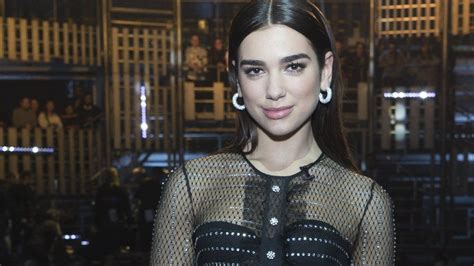 Dua Lipa sued for putting paparazzi photo of herself on Instagram .